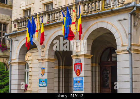 SIGHISOARA, ROMANIA - AUGUST 1, 2018: front of Mures County City Hall in Sighisoara, Transylvania Stock Photo