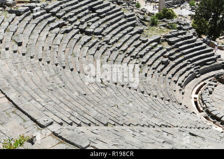 The ruins in Delphi, an archaeological site in Greece at the Mount Parnassus. Delphi is famous by the oracle at the sanctuary dedicated to Apollo. UNE Stock Photo