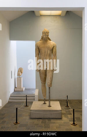 Kouros, ancient Greek sculpture of the archaic period, in the Archaeological museum of Vathy, in Samos island, Aegean sea, Greece. Stock Photo