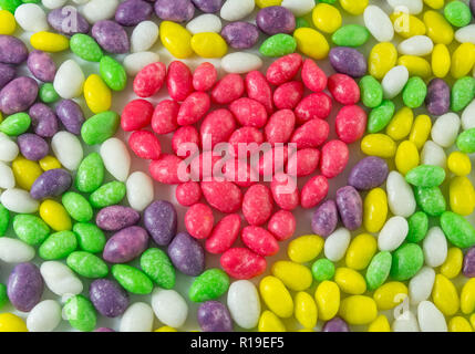 colorful candy sweets red candy heart-shaped, background texture Stock Photo