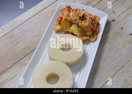 Yam and fried egg source Stock Photo