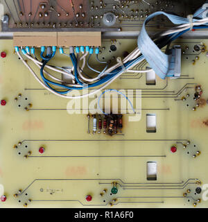 Old circuit traces on a motherboard in close up Stock Photo