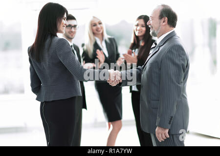 Business handshake and business people concept. Two men shaking hands. Stock Photo