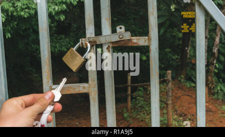 Key to a lock to the secret water fall entry in Costa Rica Stock Photo