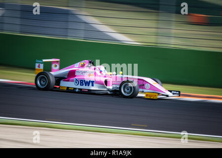 Vallelunga, Rome, Italy september 16 2018, Aci racing weekend. Formula 4 racing pink car at turn during the race, blurred motion background Stock Photo