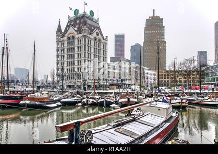 Rotterdam, The Netherlands, March 3, 2018: historic skyscrpaer the White House and the Old Harbour on a cold day in winter Stock Photo