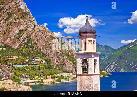 Tower in Limone sul Garda and lake cliffs view, Lombardy region of Italy Stock Photo