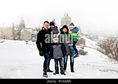 A nice family portrait in winter season outside Stock Photo