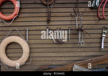 fishing boat anchors lifebuoys rod hooks float fishing Stock Photo