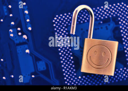 Digital security concept: Open lock on computer chip background with copy space Stock Photo
