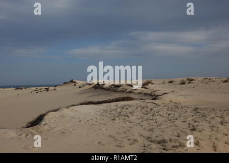 Dramatic beautiful interesting sky in evening light over the dunes in the Natural park of Corralejo,Fuerteventura,Las Palmas,Canary islands,Spain. Stock Photo