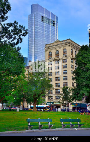 Boston skyline tall buildings seen from Boston Common park with Millennium Tower apartment complex, Massachusetts, USA Stock Photo