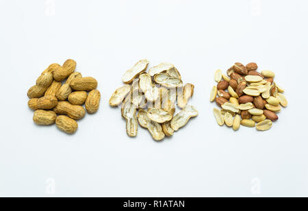 Peanuts in shell and without shells isolated on white background with clipping path. Stock Photo