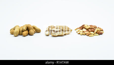 Peanuts in shell and without shells isolated on white background with clipping path. Stock Photo