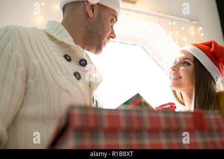 Loving couple celebrating Christmas Stock Photo