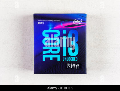 Maykop, Russia - November 9, 2018: intel core I3 desktop processor 8th gen in box on grey background closeup top view Stock Photo