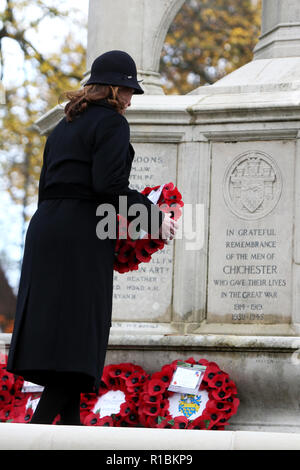 Chichester Remembrance, West Sussex, UK. Gillian Keegan, MP for the Chichester Constituency pictured amongst other VIPs at Litten Gardens, St Pancras Road, Chichester for the Service of Remembrance. 11th November 2018. The City Council has commissioned a special sculpture that will be located in a newly designed Garden of Reflection and Reconciliation located on the North side of Litten Gardens. In the adjacent New Park Road, the Garrison Artillery Volunteers will be manning a World War One 18 pdr gun in New Park Road and firing a barrage of ten rounds in the moments immediately preceding the  Stock Photo
