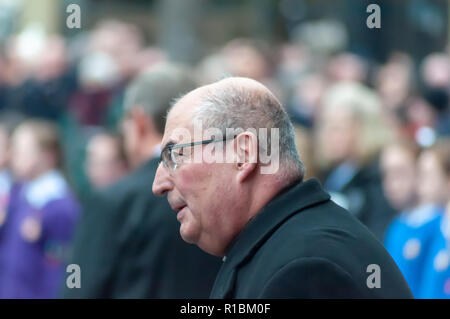 Glasgow, Scotland, UK. 11th November, 2018. The Archbishop of Glasgow Philip Tartaglia attends a Remembrance Sunday service at the Cenotaph in George Square on the 100th anniversary of the signing of the Armistice which marked the end of the First World War. Credit: Skully/Alamy Live News Stock Photo