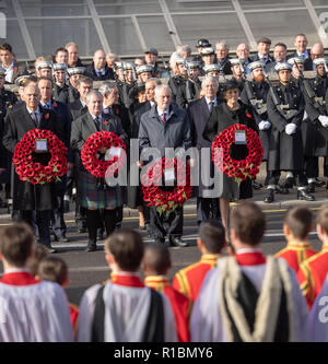 London UK, 11th November 2018  The National Service of Remembrance  at the Cenotaph London on Remembrance Sunday in the presence of HM The Queen, the Prime Minster, Theresa May, former prime ministers, senior government ministers  and representatives of the Commenwealth The Prime minister Theresa May with a wreath (right) behind her is John Mjaor, former Prime minister In the center is Jeremy Corybn, Leader of the laobur Party, bhind him is Tony Blair, former Prime Minister, He is talkginto Gordan Brown, former Prime Minister,  , Credit Ian Davidson/Alamy Live News Stock Photo