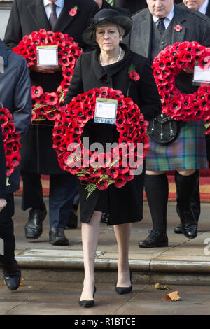 London, UK. 11th Nov, 2018. British Prime Minister Theresa May attends the annual remembrance ceremony marking the 100th anniversary of the end of the First World War in London, Britain on Nov. 11, 2018. Queen Elizabeth II was joined on Sunday morning by thousands of former and current soldiers, leading politicians and diplomats in marking the 100th anniversary of the end of the First World War at the annual Remembrance Day parade in central London. Credit: Ray Tang/Xinhua/Alamy Live News Stock Photo