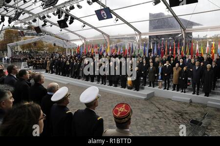 Paris, France. 11th Nov 2018. World leaders gathered for the Centennial of Armistice Day stand for a moment of silence at the Arc de Triomphe during ceremonies marking the end of the war November 11, 2018 in Paris, France. Credit: Planetpix/Alamy Live News Stock Photo