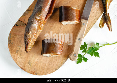 Smoked eel ready to eat. Delicious freshly made seafood. Stock Photo