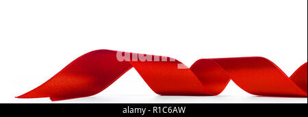 Fabric red ribbon isolated on a white background Stock Photo