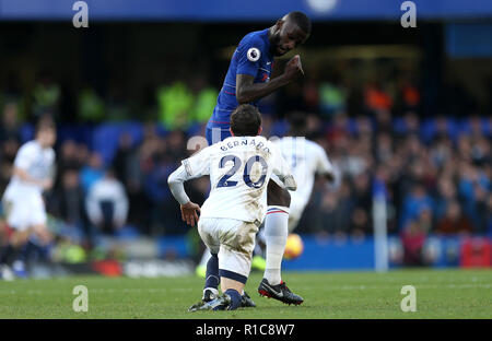 Everton's Bernard (left) and Chelsea's Antonio Rudiger clash during the Premier League match at Stamford Bridge, London. Stock Photo