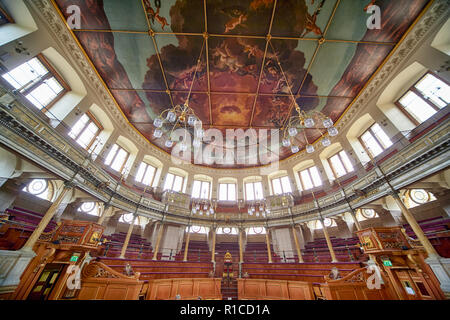 OXFORD, ENGLAND – MAY 15, 2009: Sheldonian Theatre interior with semi-circular auditorium for the university ceremonies and glorious allegorical ceili Stock Photo