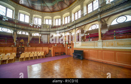 OXFORD, ENGLAND – MAY 15, 2009: Sheldonian Theatre interior with semi-circular auditorium for the university ceremonies and glorious allegorical ceili Stock Photo