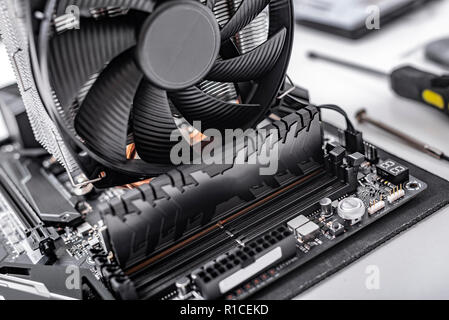Motherboard, with installed cooler and RAM. Stock Photo