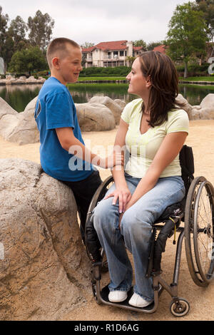 Disabled Parent and son talking about life    © Myrleen Pearson  ...Ferguson Cate Stock Photo