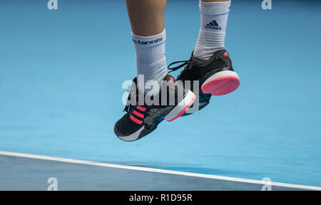 London, UK. 11th Nov 2018. The Adidas tennis shoes of Dominic Thiem  (Austria) during the Nitto ATP World Tour Finals London at the O2, London,  England on 11 November 2018. Photo by Andy Rowland. Credit: Andrew  Rowland/Alamy Live News Stock ...