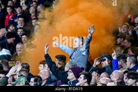 London, UK. 11th Nov 2018. Wolverhampton supporters celebrate with 'orange' during the Premier League match between Arsenal and Wolverhampton Wanderers at the Emirates Stadium, London, England on 11 November 2018. Photo by Phil Hutchinson.  Editorial use only, license required for commercial use. No use in betting, games or a single club/league/player publications. Credit: UK Sports Pics Ltd/Alamy Live News Stock Photo