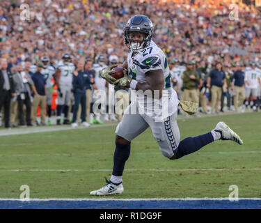 Los Angeles, CA, USA. 11th Nov, 2018. Seattle Seahawks running back Mike Davis (27) about to cross the goal line during the NFL Seattle Seahawks vs Los Angeles Rams at the Los Angeles Memorial Coliseum in Los Angeles, Ca on November 11, 2018. Jevone Moore Credit: csm/Alamy Live News Stock Photo