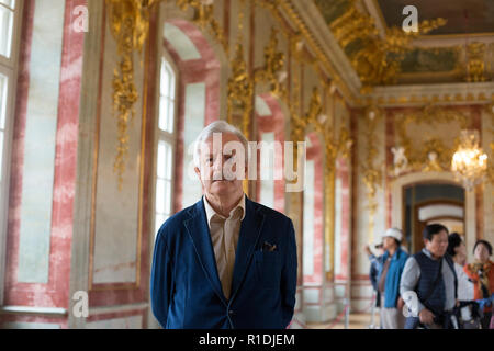 Rundale, Latvia. 26th Aug, 2018. The art historian and long-time castle director Imants Lancmanis stands in Rundale Castle in the Golden Hall. The Latvian art historian Imants Lancmanis has dedicated more than 50 years of his life to the restoration of the largest baroque castle in the Baltic States. Now the lord of the castle is retiring. (to dpa-KORR.: 'Enough renovated: lord of the castle of the 'Latvian Versailles' retires' from 12.11.2018) Credit: Alexander Welscher/dpa/Alamy Live News Stock Photo