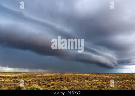 Dramatic shelf cloud on a storm along a cold front over a field Stock Photo