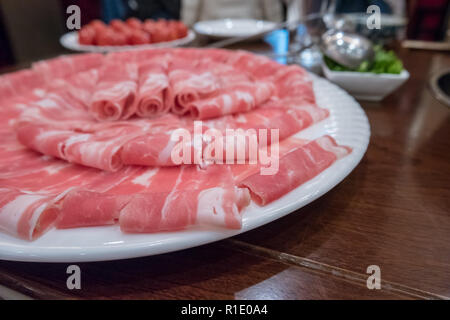 Hotpot beef rolls closeup on plate Stock Photo