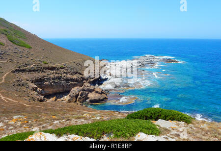 Wild rocky cliff on the coast of Sardinia, Torre dei Corsari Stock Photo