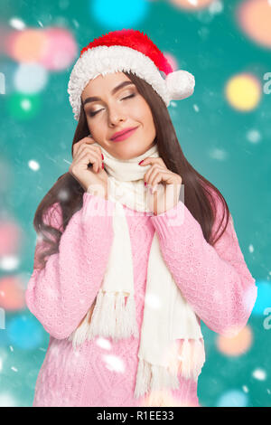 Model in sweater and christmas hat Stock Photo