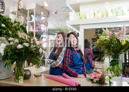 Two florists in flower shop Stock Photo