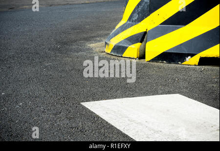 Yellow And Black Striped Caution Traffic Sign Stock Photo - Alamy