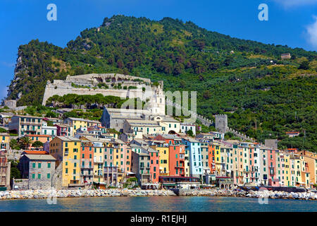 Colourful row of houses at the harbour of Portovenere, province La Spezia, Riviera di Levante, Liguria, Italy Stock Photo