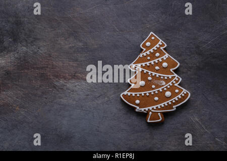 Gingerbread cookies tree on dark background, copyspace Stock Photo