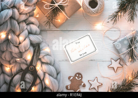 Christmas letter,fruits,gift boxes and warm sweater Stock Photo