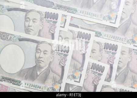 Japanese banknotes set. 10,000, 5,000, 2,000 and 1,000 yen notes. Laid ...