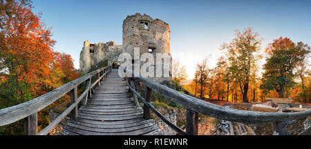 Beautiful Slovakia landscape at autumn with Uhrovec castle ruins at sunset Stock Photo