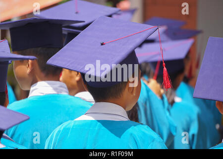 Back of primary school graduation ceremony. Stock Photo