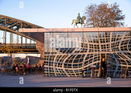 the restaurant Grissini in front of the hotel Hyatt Regency on the banks of the river Rhine in the district Deutz, equestrian statue at the Hohenzolle Stock Photo