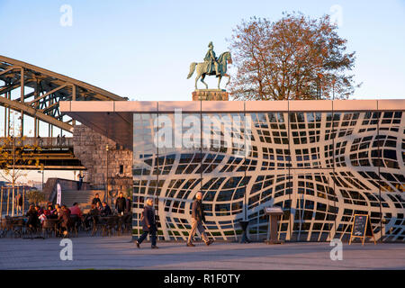 the restaurant Grissini in front of the hotel Hyatt Regency on the banks of the river Rhine in the district Deutz, equestrian statue at the Hohenzolle Stock Photo